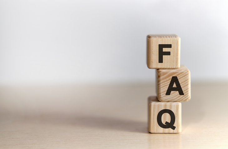 FAQ - text on wooden cubes, on wooden background FAQ - text on wooden cubes, on wooden background